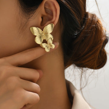 Mariah - Goldene Ohrringe in Schmetterlingsform